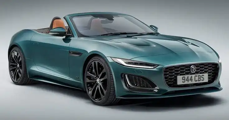 Green convertible sports car with sleek design, black alloy wheels, and tan interior, showcasing luxury and performance on a