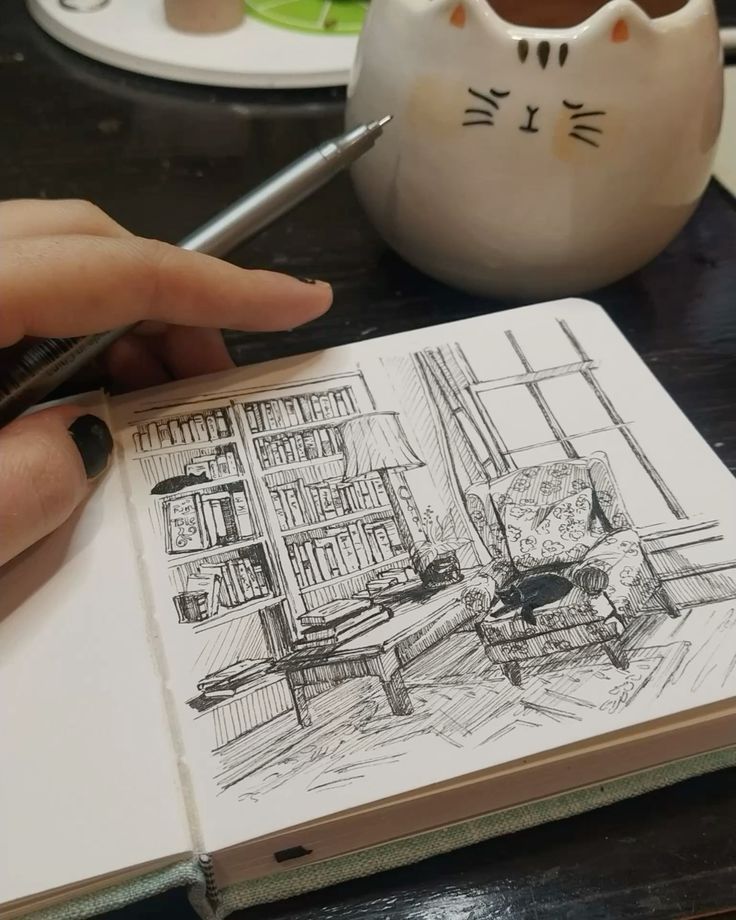 Manga Art Style 1 Hand sketching a cozy living room scene with a bookshelf, armchair, and cat, alongside a cute cat-themed mug on a wooden table. | Sky Rye Design Hand sketching a cozy living room scene with a bookshelf, armchair, and cat, alongside a cute cat-themed mug on a wooden table.