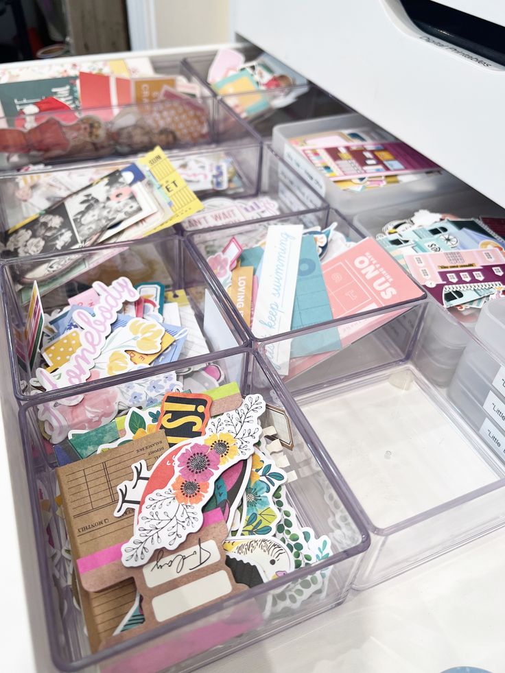 Organizing die cuts Organized craft supplies, stickers, and cutouts neatly stored in transparent drawer dividers, perfect for scrapbooking and creative projects. | Sky Rye Design Organized craft supplies, stickers, and cutouts neatly stored in transparent drawer dividers, perfect for scrapbooking and creative projects. Beginner's Scrapbooking Guide