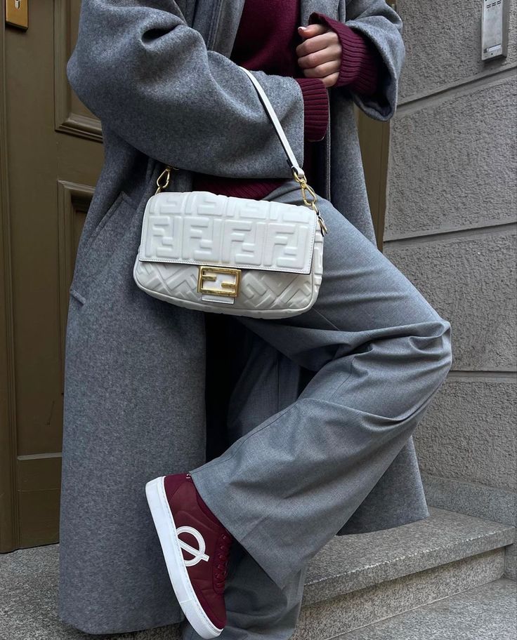 Outfit for today ❤️ Stylish outfit with grey coat, burgundy sweater, white designer bag, and maroon sneakers, perfect for a trendy street look. | Sky Rye Design Stylish outfit with grey coat, burgundy sweater, white designer bag, and maroon sneakers, perfect for a trendy street look.