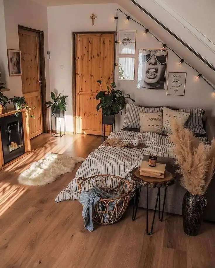 Cozy bedroom with wooden accents, fairy lights, and a stylish bed. Features plants, boho decor, and natural light for a serene atmosphere.