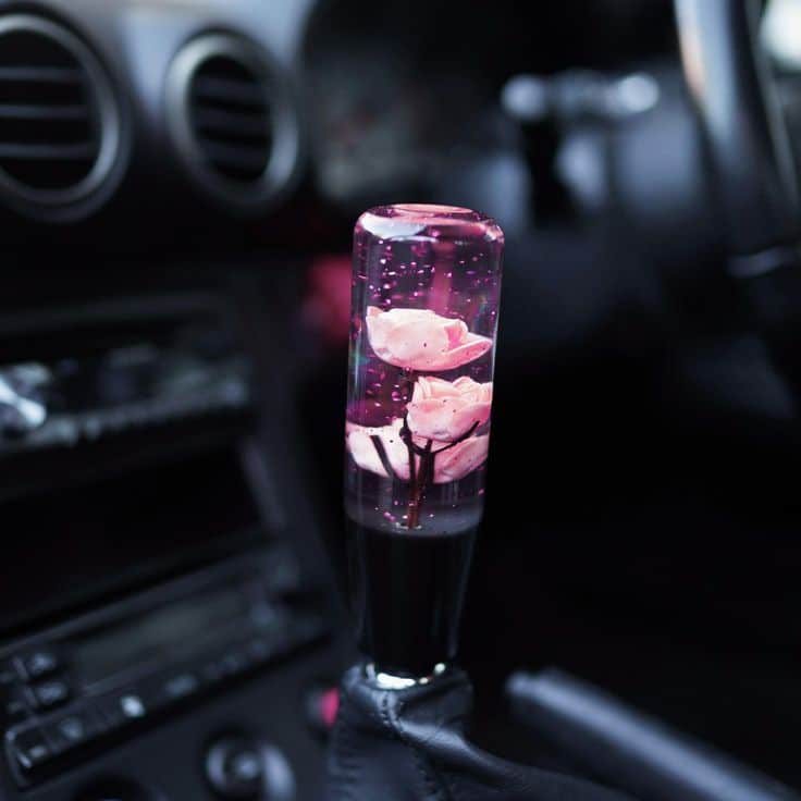 Shift Knob - Sparkling Roses Pink Unique car gear shift knob with embedded pink flowers, enhancing car interior style and adding a touch of elegance. | Sky Rye Design Unique car gear shift knob with embedded pink flowers, enhancing car interior style and adding a touch of elegance.