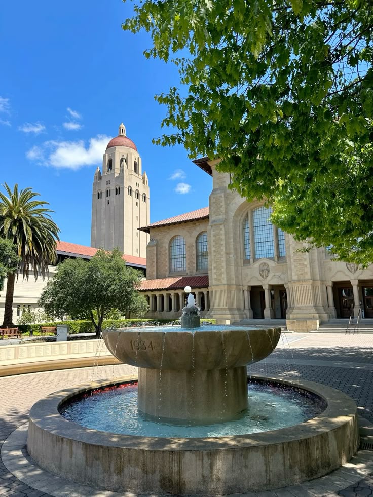 Stanford University Historic tower and fountain with scenic architecture, surrounded by greenery and blue skies, perfect for exploring cultural landmarks. | Sky Rye Design Historic tower and fountain with scenic architecture, surrounded by greenery and blue skies, perfect for exploring cultural landmarks.