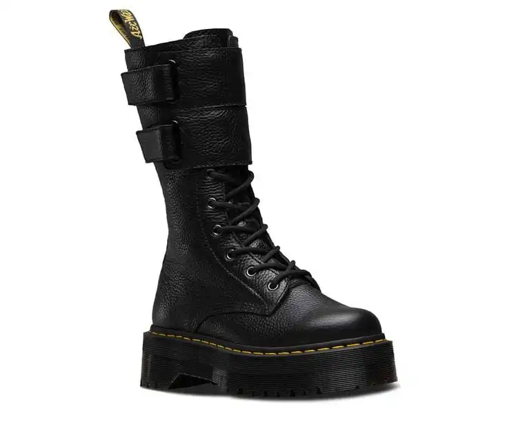 Tall black leather boot with laces, dual buckle straps, and rugged sole, ideal for edgy fashion or outdoor wear.