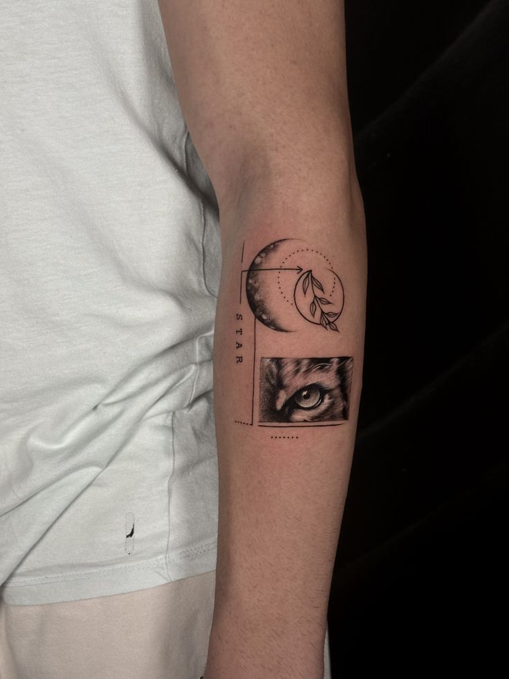 Tiger Eye Moon Fusion Tattoo _ Minimal Surreal Design Greek style Forearm tattoo featuring a moon with leaves and a detailed eye design, combining celestial and natural elements for a unique look. | Sky Rye Design Forearm tattoo featuring a moon with leaves and a detailed eye design, combining celestial and natural elements for a unique look. Significance of Eye Tattoos