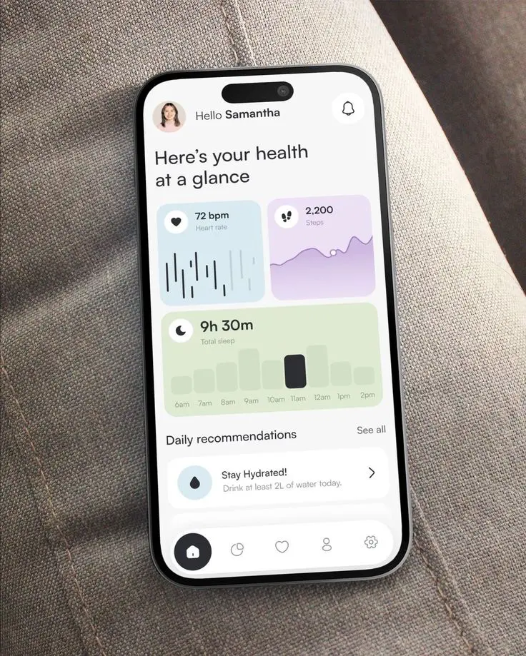 Ultra-Fast Interfaces 4 Smartphone displaying a health app dashboard with heart rate, steps, sleep data, and hydration tips on a gray fabric surface. | Sky Rye Design Smartphone displaying a health app dashboard with heart rate, steps, sleep data, and hydration tips on a gray fabric surface.