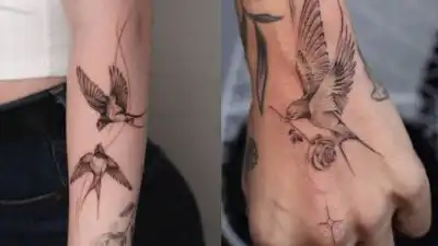 Detailed bird tattoos on arms, featuring flying swallows with intricate designs, showcasing elegant artistry and