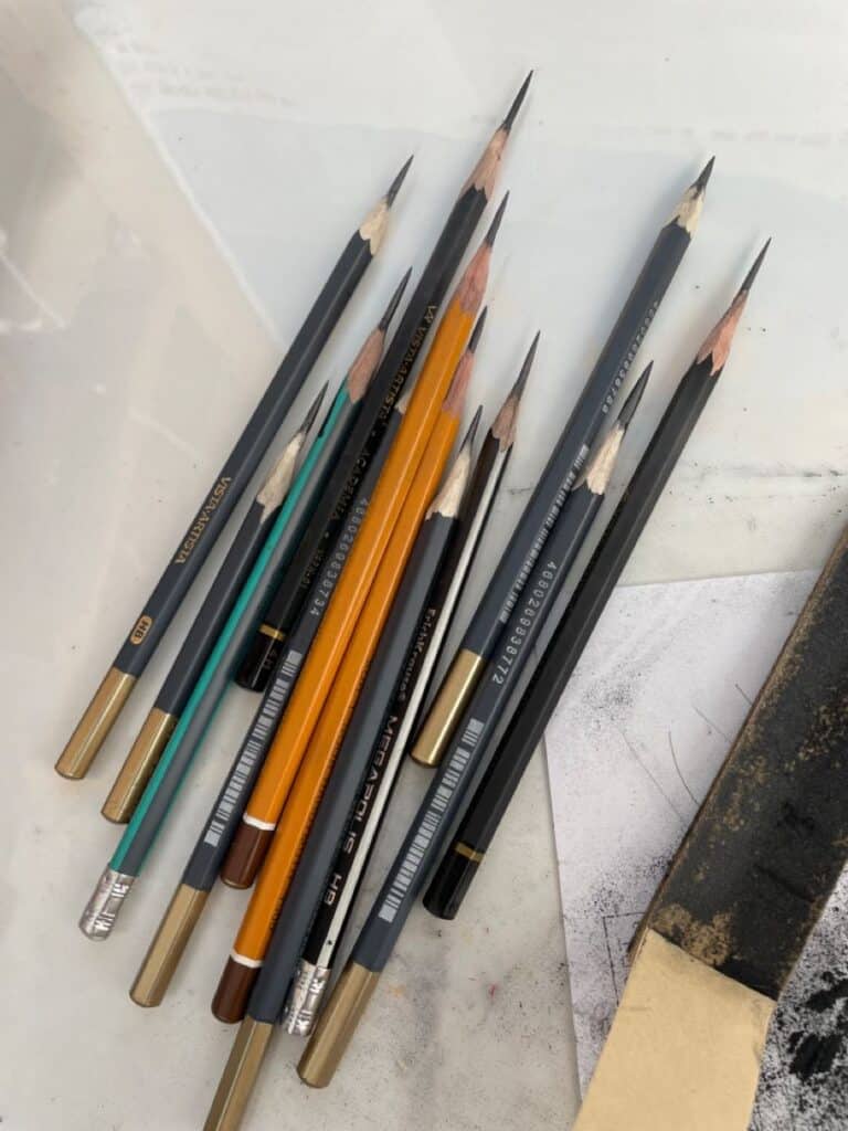 a6dc318e8b82861d8b60276489760d99 Assortment of sharpened pencils in various colors arranged on a white surface, ideal for sketching or detailed drawing tasks. | Sky Rye Design Assortment of sharpened pencils in various colors arranged on a white surface, ideal for sketching or detailed drawing tasks.