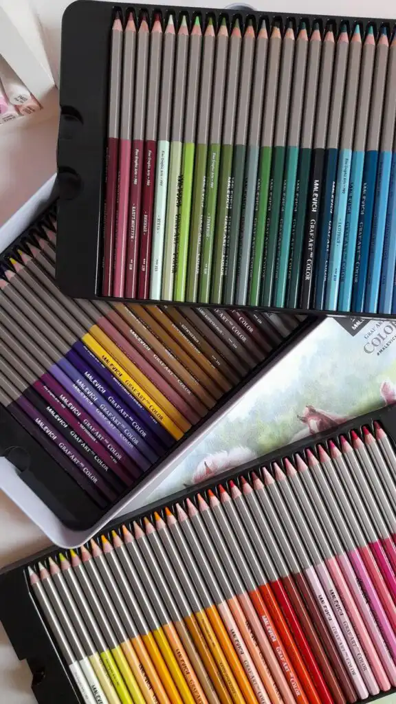 colored pencils aesthetic 🤍🌸 Set of vibrant colored pencils neatly arranged in open boxes, showcasing a wide spectrum of shades for art and creativity. | Sky Rye Design Set of vibrant colored pencils neatly arranged in open boxes, showcasing a wide spectrum of shades for art and creativity.