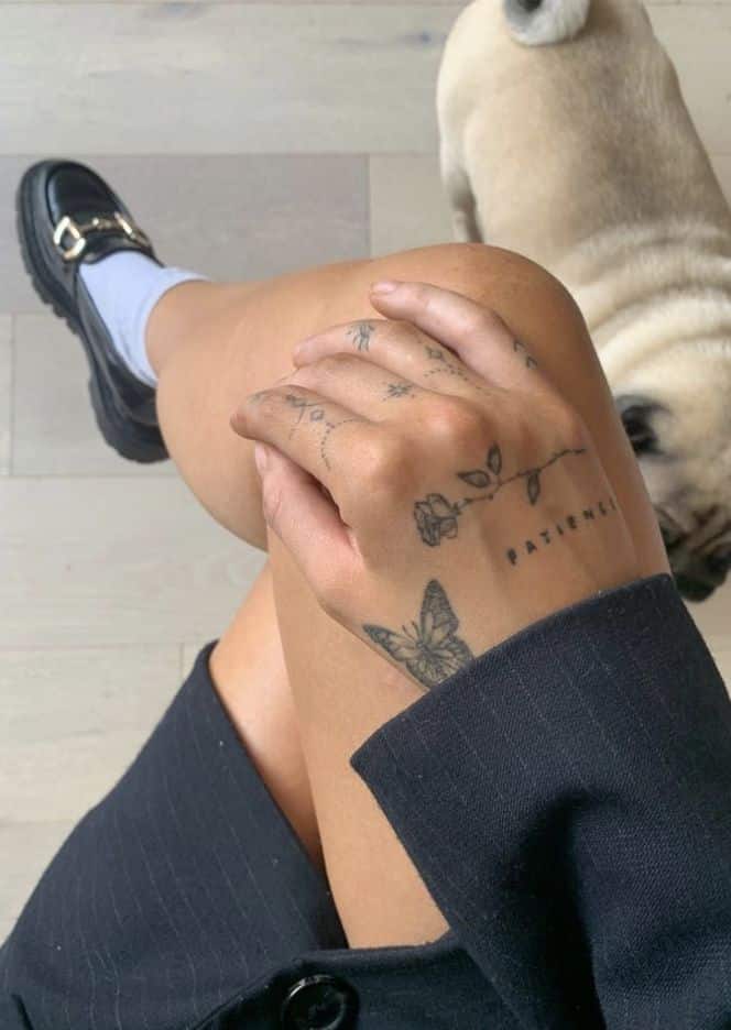 eb884e82-e7b5-4f15-ad08-64c7d88d3e52 Crossed legs with tattoos and loafers, a pug nearby on the wooden floor, stylish and relaxed ambiance. | Sky Rye Design Crossed legs with tattoos and loafers, a pug nearby on the wooden floor, stylish and relaxed ambiance.