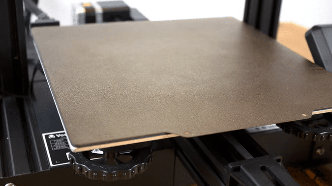 image 3D printer platform with adjustable knobs, designed for precise printing tasks, displayed in a workshop setting. | Sky Rye Design 3D printer platform with adjustable knobs, designed for precise printing tasks, displayed in a workshop setting.