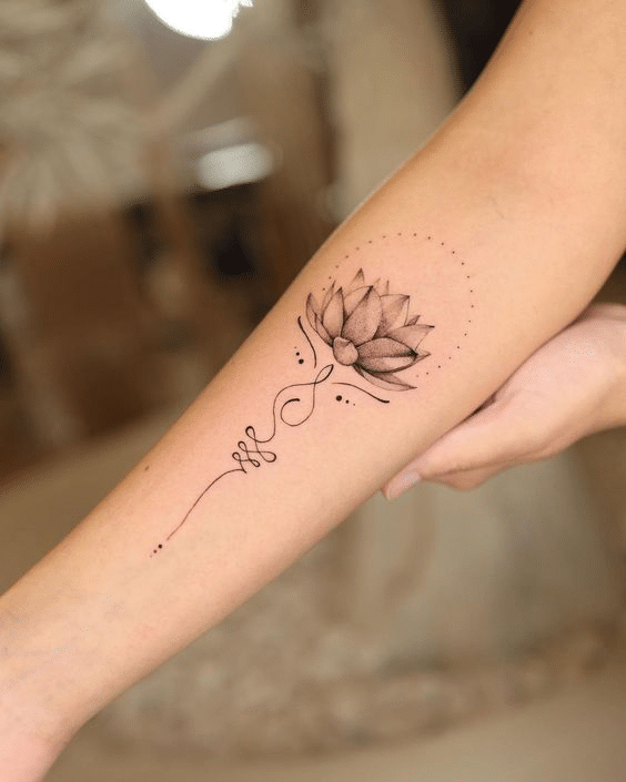 image Minimalist lotus tattoo design on forearm, featuring delicate lines and dots. Perfect for seekers of elegant and meaningful body art. | Sky Rye Design Minimalist lotus tattoo design on forearm, featuring delicate lines and dots. Perfect for seekers of elegant and meaningful body art.