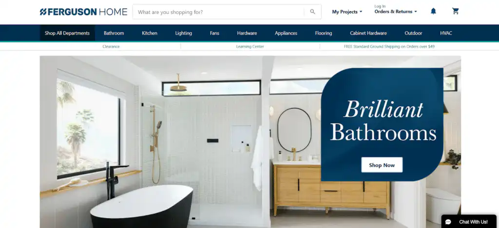 Modern bathroom with a freestanding tub, glass shower, and wooden vanity. Brilliant Bathrooms text overlay with a shop now button.