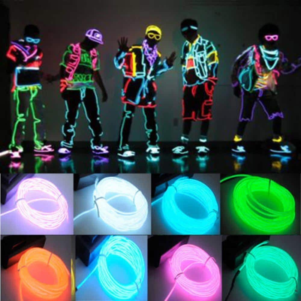 image LED light outfits and neon wire colors create a vibrant glow in the dark scene with people in illuminated costumes and | Sky Rye Design LED light outfits and neon wire colors create a vibrant glow in the dark scene with people in illuminated costumes and