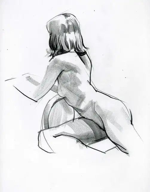 Charcoal sketch of a woman sitting with her back to the viewer, showcasing artistic shading techniques and anatomical study.
