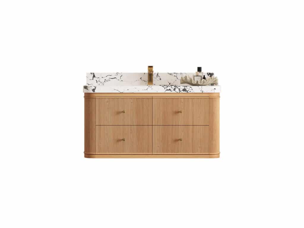 Modern wooden fluted bathroom vanity with white marble countertop, gold faucet and two drawers, styled with toiletries on top