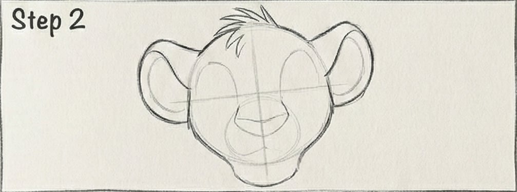 Step 2: Sketch of a cartoon lion cub's face in pencil, showing basic outlines and features like ears, nose, and eyes on a blank background.