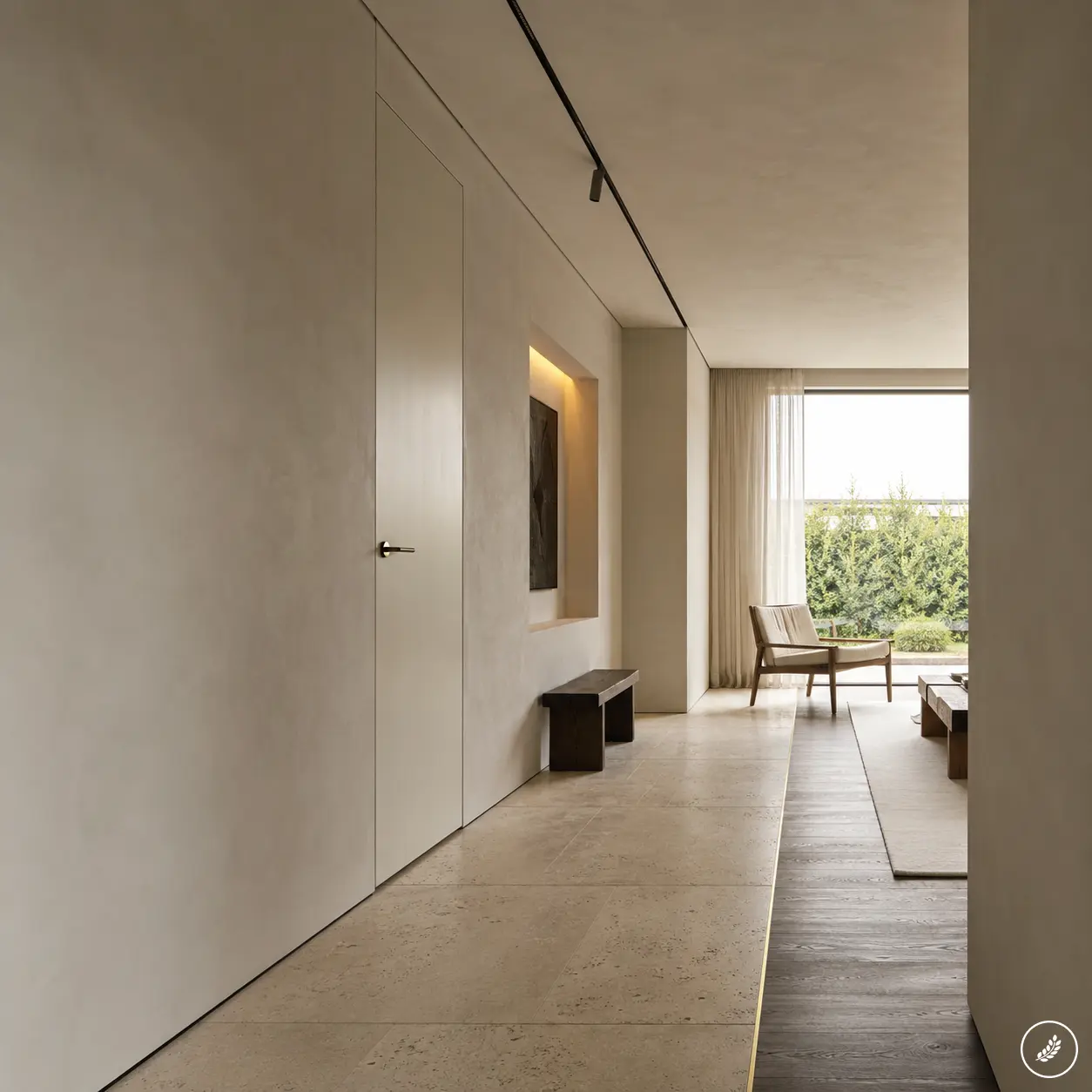 3032cd60-a193-41b6-b6ac-57d95d9f0ec2 Minimal modern neutral interior hallway leading to sunlit living room with bench, armchair and large window view | Sky Rye Design Minimal modern neutral interior hallway leading to sunlit living room with bench, armchair and large window view