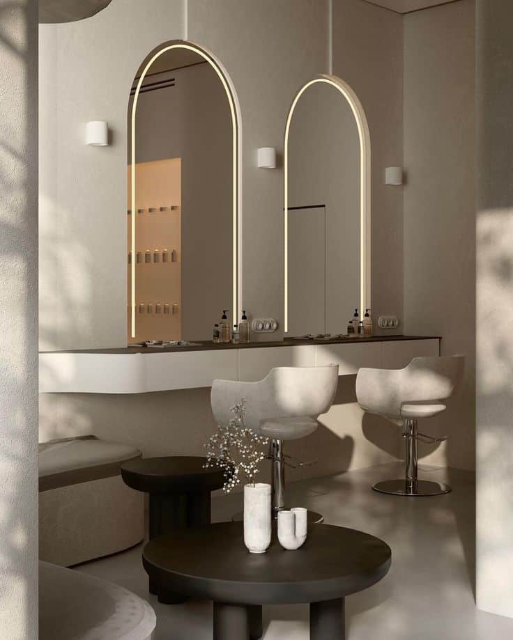 ДИЗАЙН ИНТЕРЬЕРА СПБ _ MYS _ Проект салона🌾 _ Instagram Minimalist salon interior with arched mirrors, stylish chairs, and modern decor in neutral tones, creating an elegant and serene ambiance. | Sky Rye Design Minimalist salon interior with arched mirrors, stylish chairs, and modern decor in neutral tones, creating an elegant and serene ambiance.