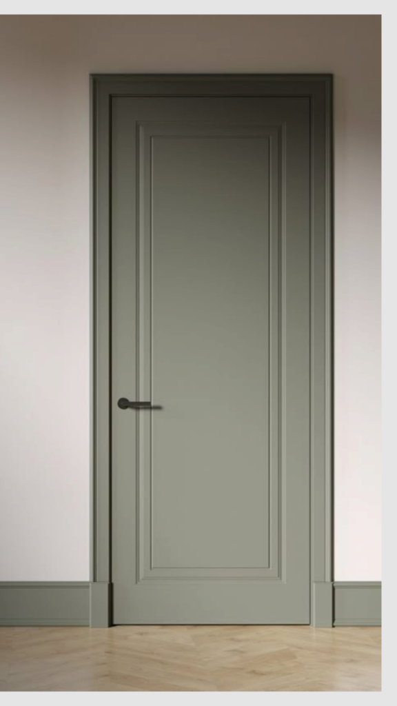 Matte sage green interior panel door with black lever handle, classic trim and herringbone wood floor — modern farmhouse, neutral color palette
