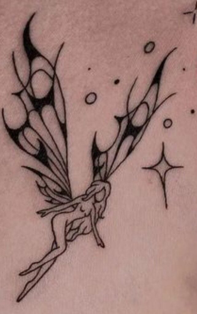 Minimalist black linework fairy tattoo on skin, featuring elongated patterned wings, nude figure silhouette and small star and dot accents.