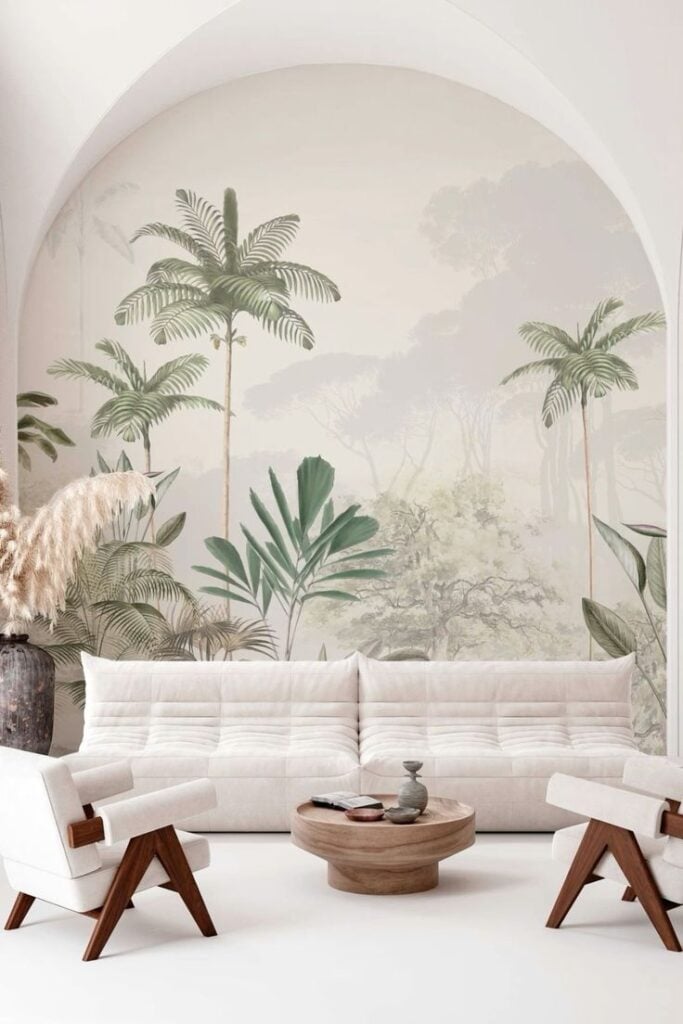 Modern neutral living room with tropical palm mural in arched niche, white tufted sofa, wooden mid-century chairs and round coffee table