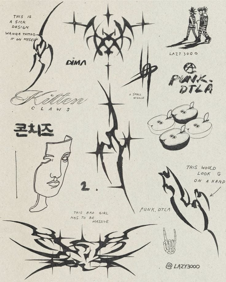 Tattoo flash sheet with black tribal motifs, sketches and lettering — kitten claws, punk DTLA, apples, abstract face on beige paper.
