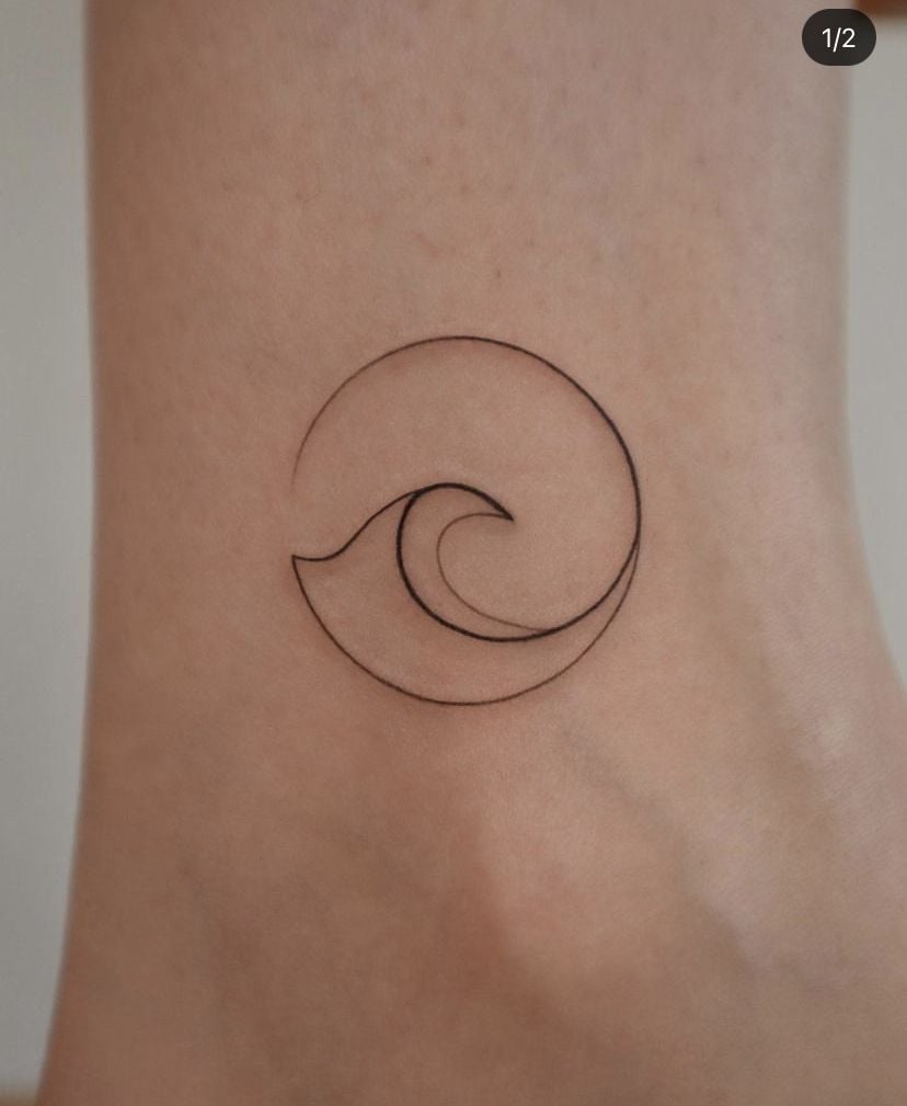 Minimalist fine-line wave tattoo in circular design on ankle — small delicate ocean-inspired ink