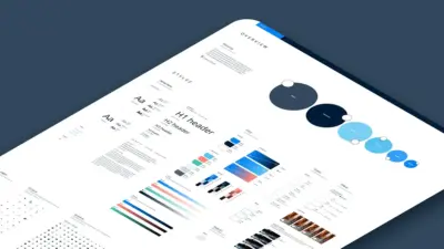 UI style guide mockup on tilted white sheet showing typography, color palette, icons and layouts on navy background