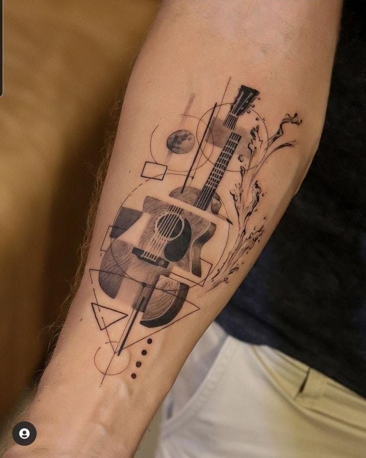 Forearm tattoo of geometric acoustic guitar with splash, moon and abstract shapes in fine blackwork style