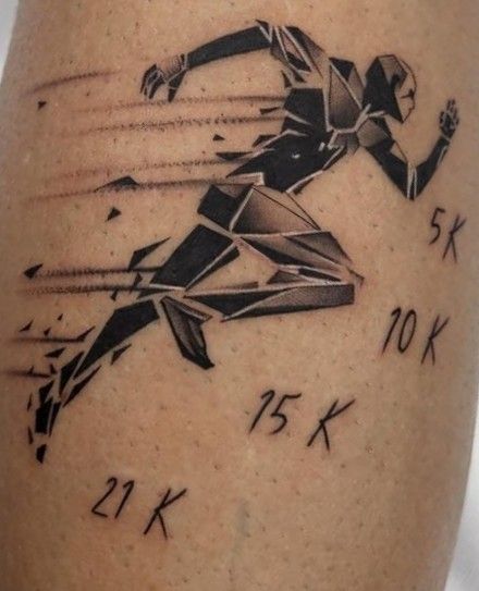 Geometric running tattoo on calf with motion shards and race distances 5K, 10K, 15K, 21K