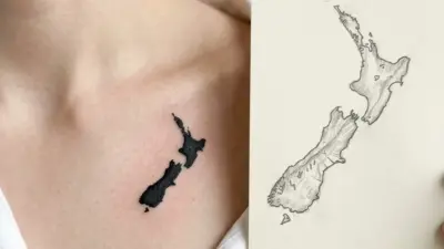 Minimalist New Zealand map tattoo on collarbone, black silhouette beside hand-drawn pencil sketch of the islands