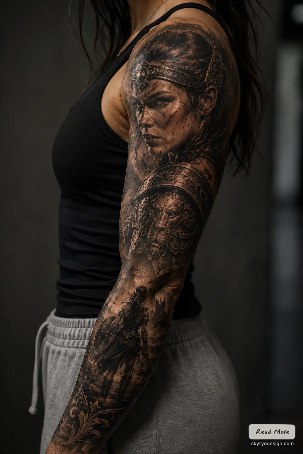 Realistic black and grey full-sleeve tattoo of a female warrior portrait, lion shield and battle scene on arm