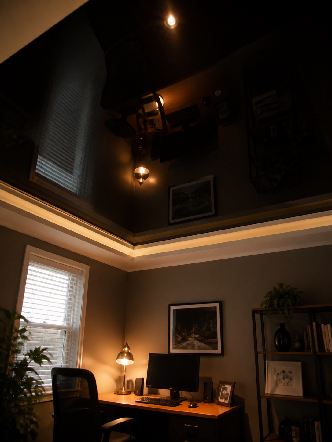 Glossy black PVC stretch ceiling in a small modern home office.