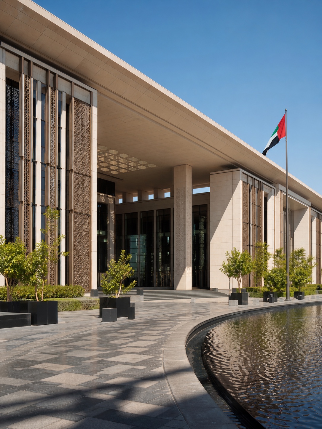 Modern Abu Dhabi government building entrance in clear midday light