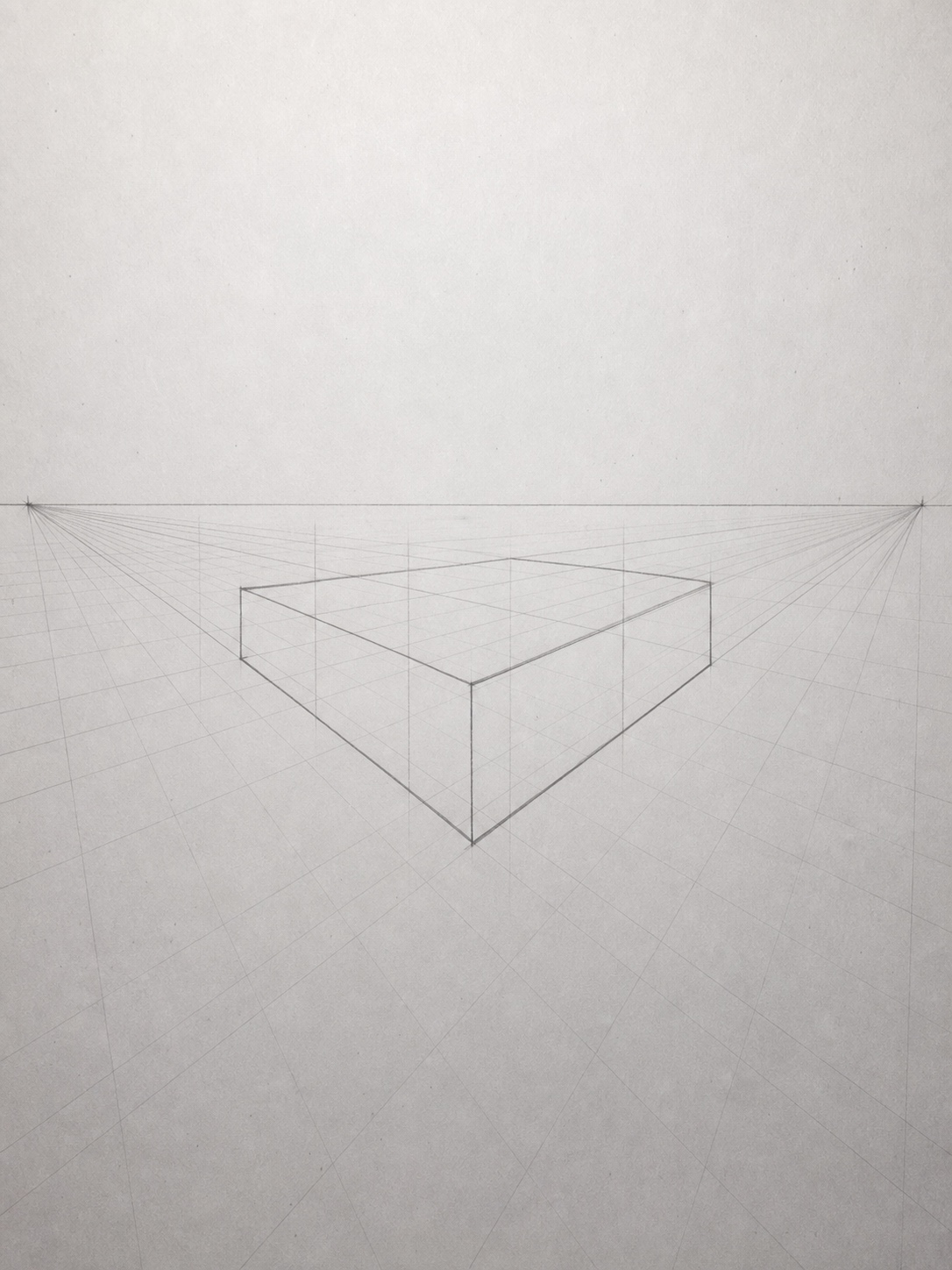 Two-point perspective construction grid for drawing a car body accurately.