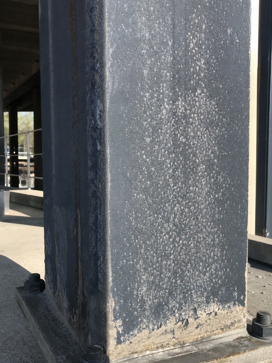 Chalking Epoxy Exterior Column Weathered exterior steel column with chalking on an aged epoxy coating. | Sky Rye Design Weathered exterior steel column with chalking on an aged epoxy coating.