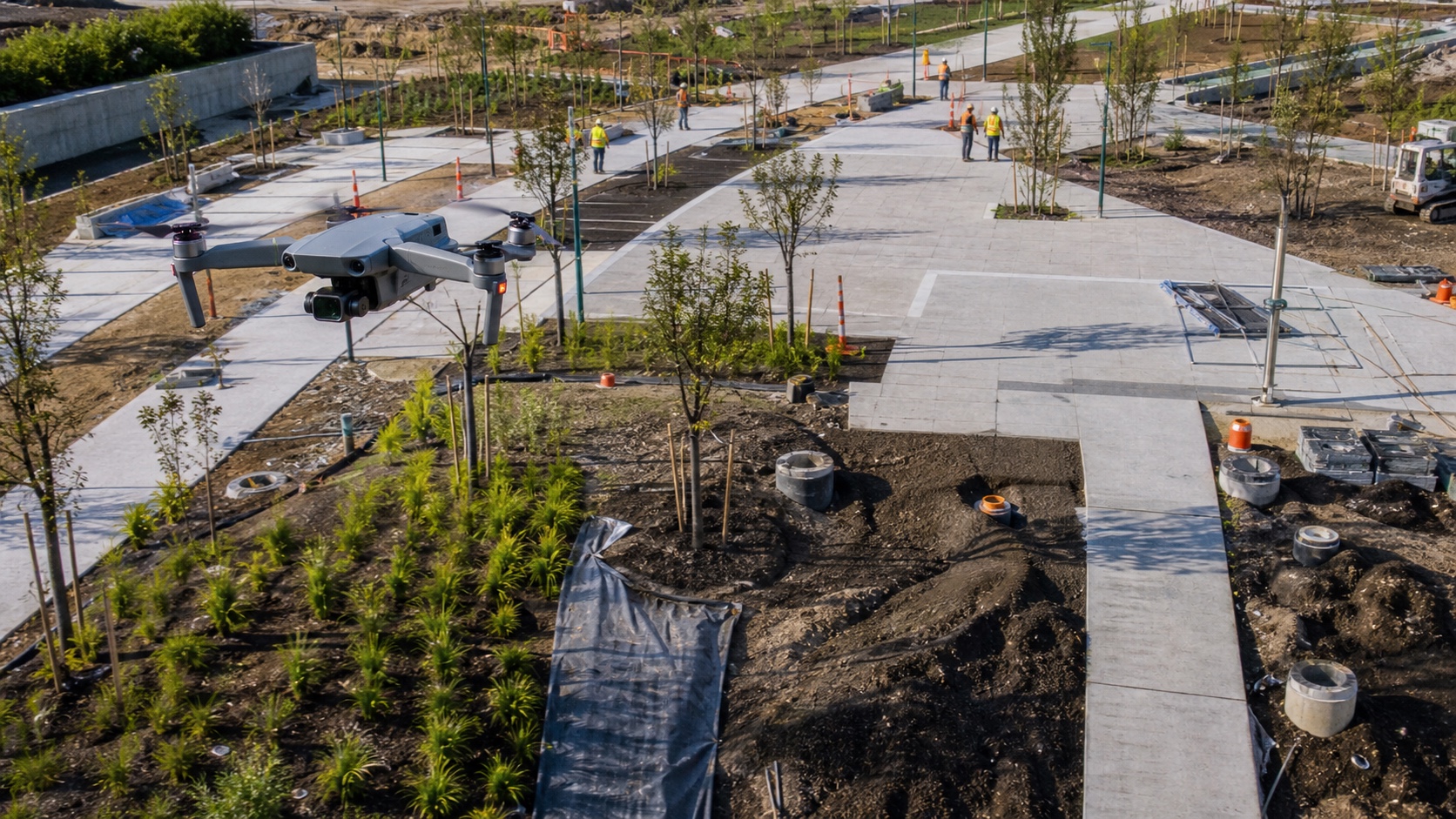 Drone construction monitoring for landscape architecture Drone monitoring construction progress on a landscape architecture project with paths, planting beds, and crews | Sky Rye Design Drone monitoring construction progress on a landscape architecture project with paths, planting beds, and crews