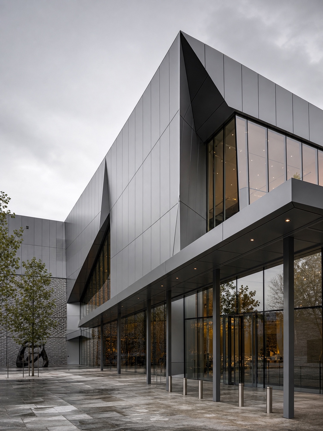 Fluoropolymer Coated Metal Facade Panels Contemporary building facade with fluoropolymer-coated metal panels and coated steel canopy details. | Sky Rye Design Contemporary building facade with fluoropolymer-coated metal panels and coated steel canopy details.