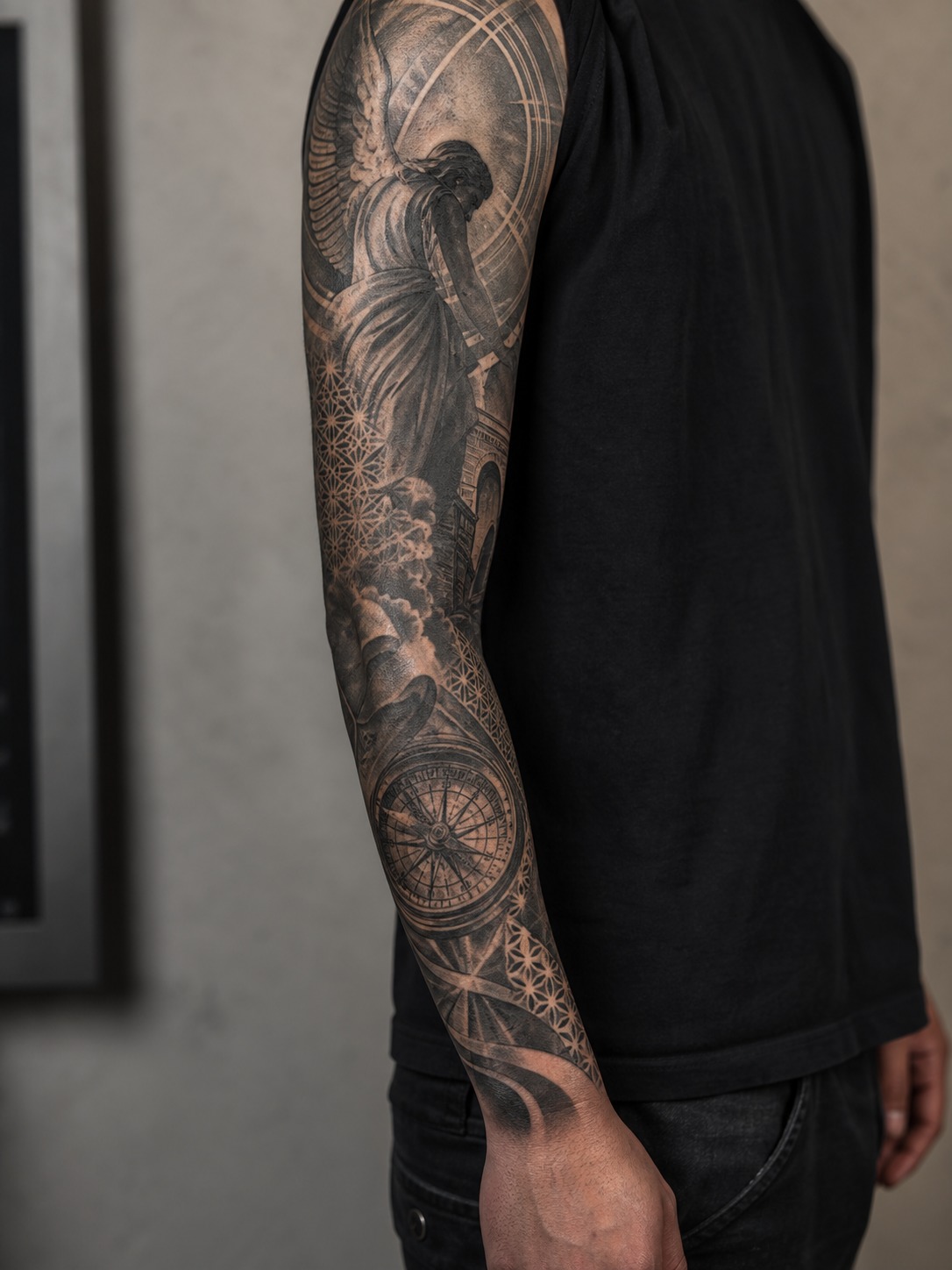 Full sleeve tattoo for men with black and grey realism Full sleeve tattoo for men with black and grey realism and geometric filler | Sky Rye Design Full sleeve tattoo for men with black and grey realism and geometric filler
