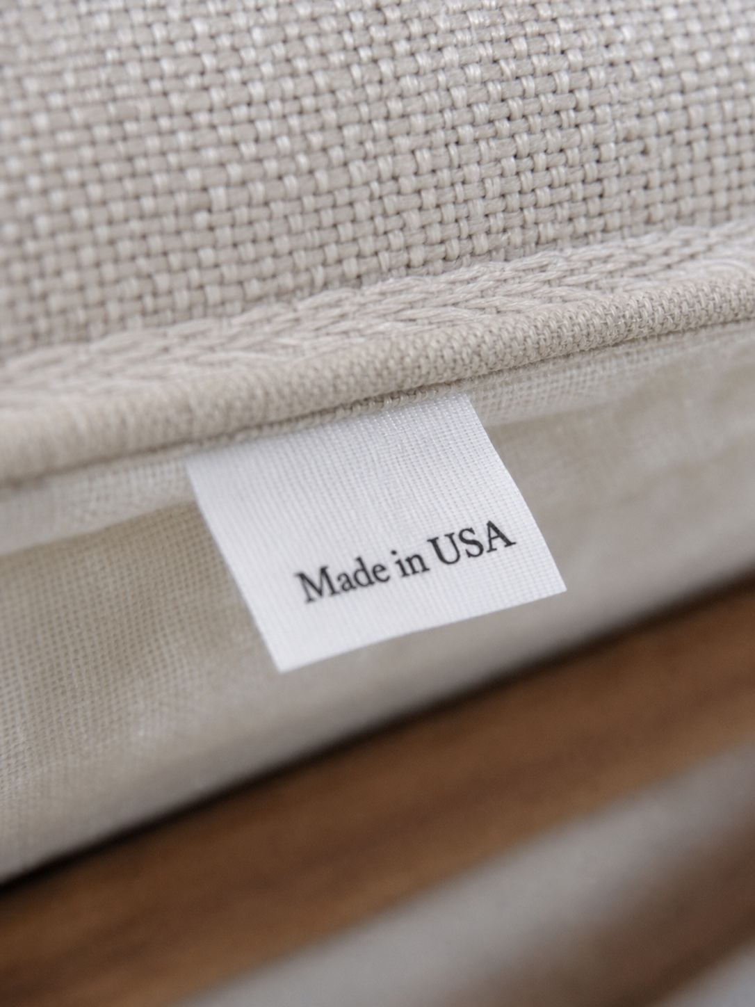 Made in USA origin label sewn into a sofa cushion