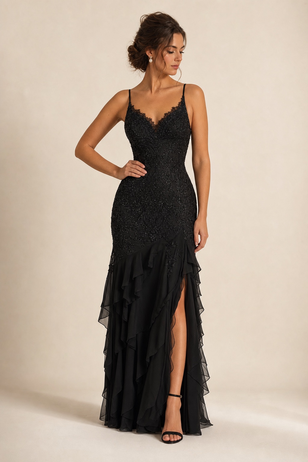 Black beaded evening gown with layered skirt Adult model in a black beaded evening gown with a layered chiffon skirt | Sky Rye Design Adult model in a black beaded evening gown with a layered chiffon skirt