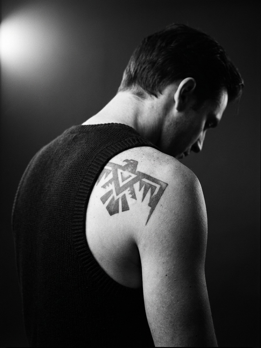 Tribal-inspired thunderbird on a man's upper back and shoulder.