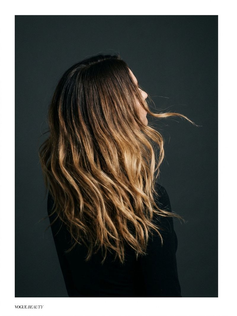 Balayage color gradient in motion Model mid hair-flip showing a balayage color gradient from dark root to warm honey tip in soft motion blur | Sky Rye Design Model mid hair-flip showing a balayage color gradient from dark root to warm honey tip in soft motion blur