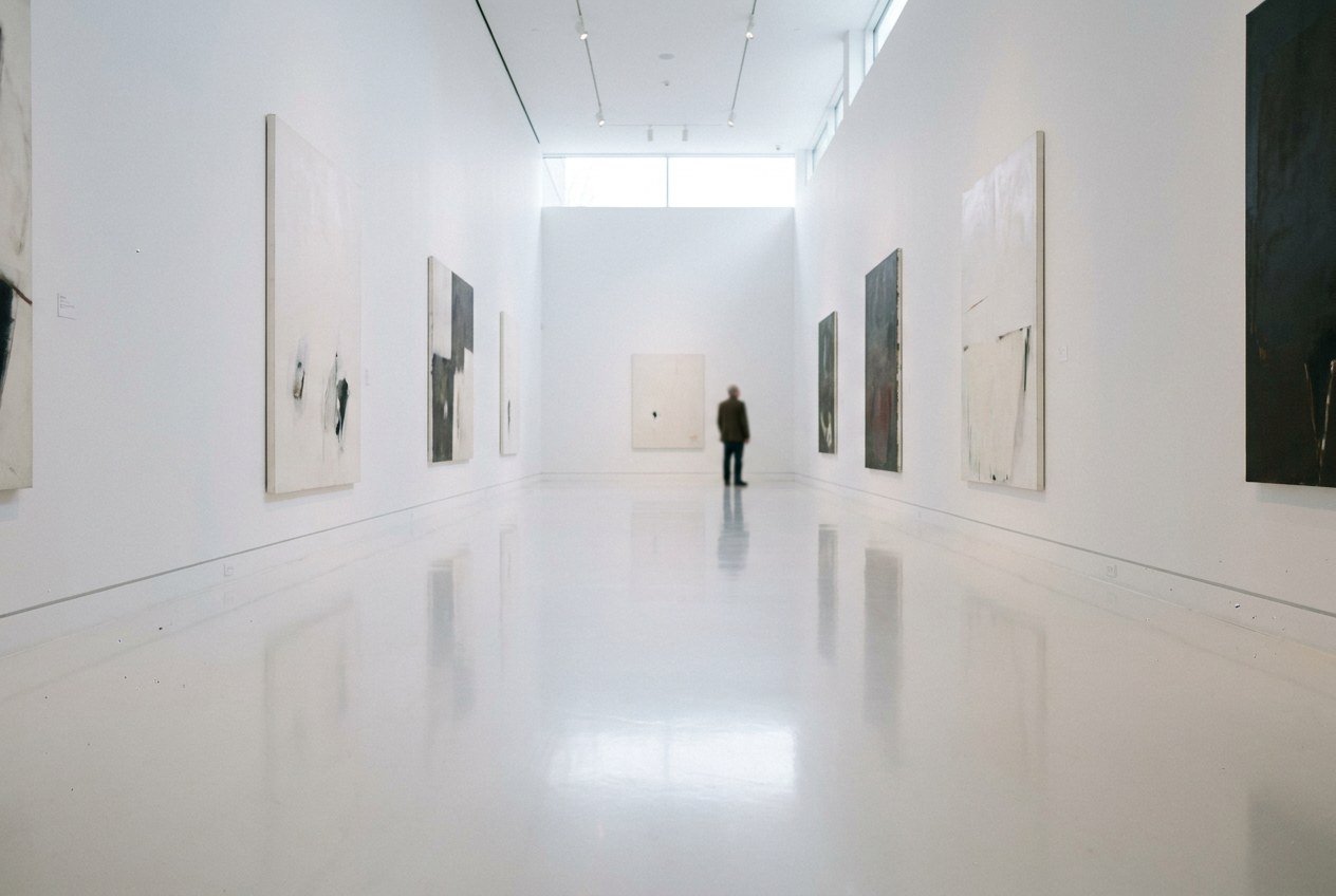 Minimalist art gallery with bright white high-gloss epoxy floor Minimalist art gallery featuring a bright white high-gloss epoxy floor with mirror reflection | Sky Rye Design Minimalist art gallery featuring a bright white high-gloss epoxy floor with mirror reflection