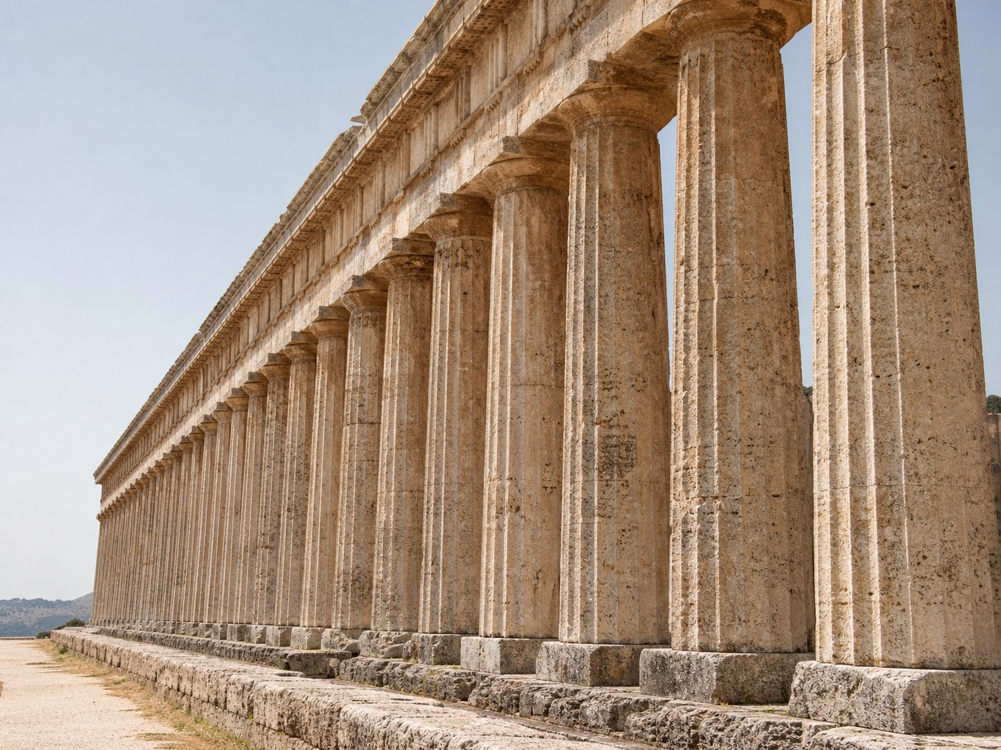 Greek Doric columns and post-and-lintel structure Weathered Doric columns supporting a straight stone entablature in a Greek post-and-lintel structure | Sky Rye Design Weathered Doric columns supporting a straight stone entablature in a Greek post-and-lintel structure