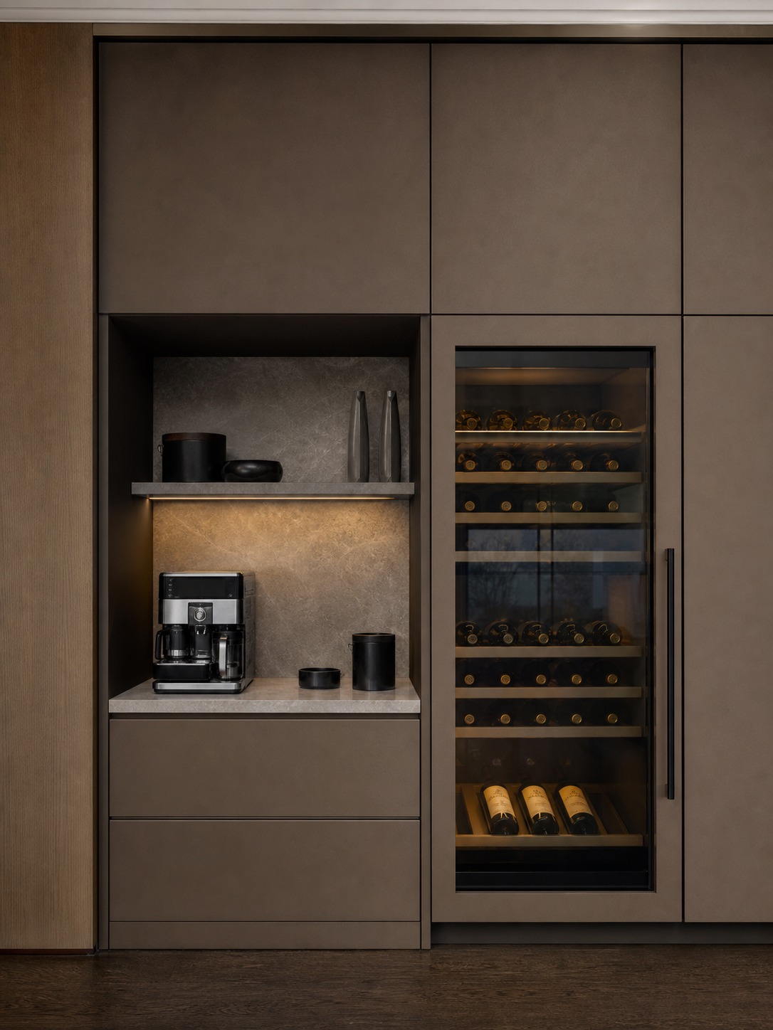 Integrated wine and coffee station in cabinetry wall Integrated wine storage and coffee station built into a flush cabinetry wall with a furniture-like finish. | Sky Rye Design Integrated wine storage and coffee station built into a flush cabinetry wall with a furniture-like finish.