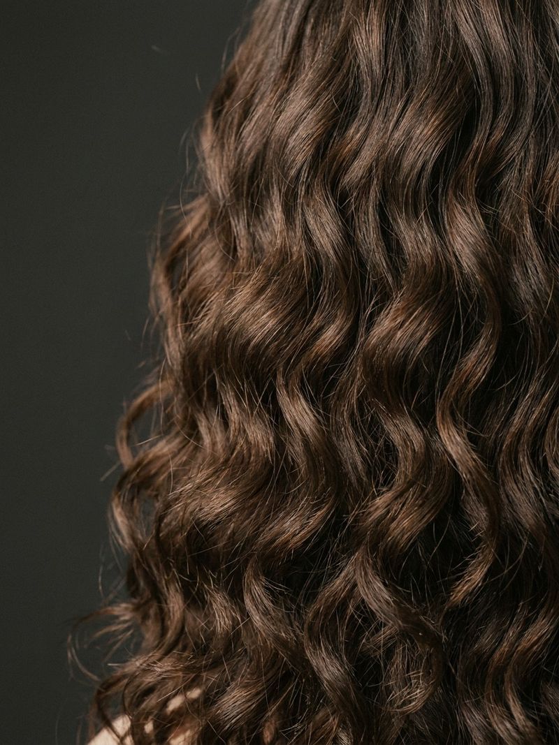 Korean digital perm curl macro detail Macro close-up of Korean digital perm curls showing a defined S-wave pattern and natural bounce | Sky Rye Design Macro close-up of Korean digital perm curls showing a defined S-wave pattern and natural bounce