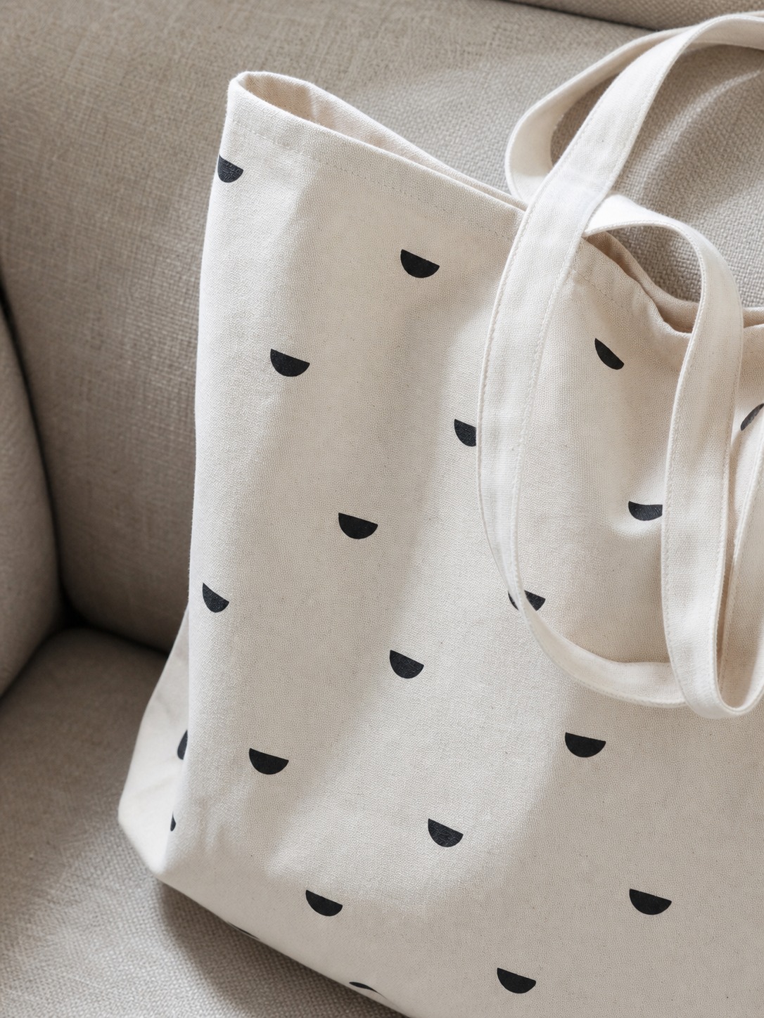 Minimal icon pattern tote bag A tote bag with a minimal repeated abstract icon pattern instead of a full logo. | Sky Rye Design A tote bag with a minimal repeated abstract icon pattern instead of a full logo.