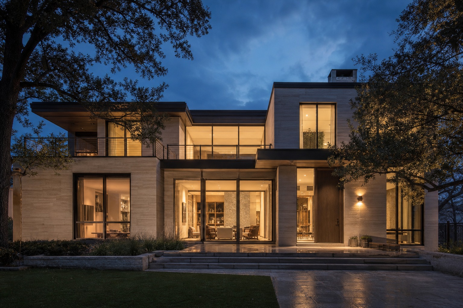 Night exterior warm glow among the trees Ultra-modern custom home at dusk with warm interior light glowing through full-height glazing. | Sky Rye Design Ultra-modern custom home at dusk with warm interior light glowing through full-height glazing.